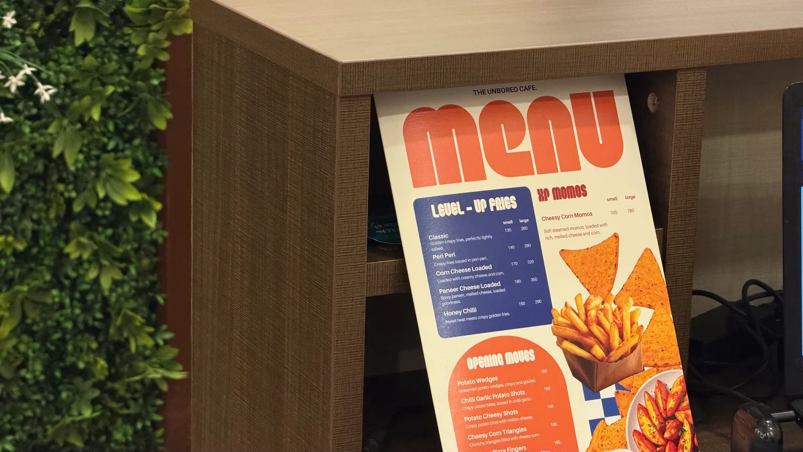 The Unbored Café menu — Level-Up Fries and XP Momos