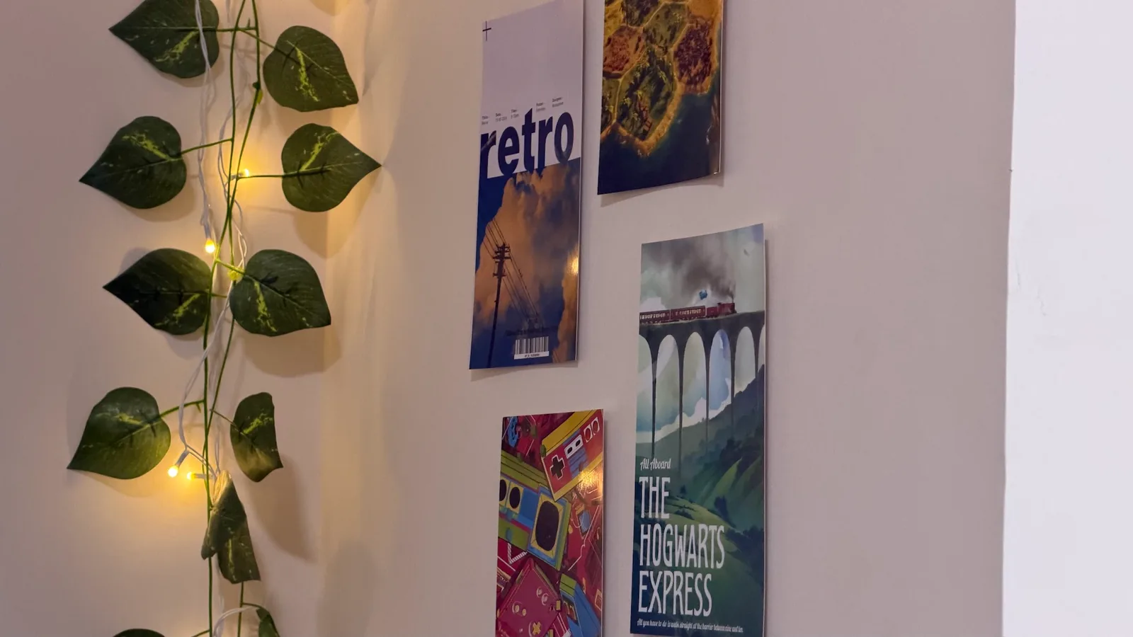 Retro posters and warm lighting on the café walls